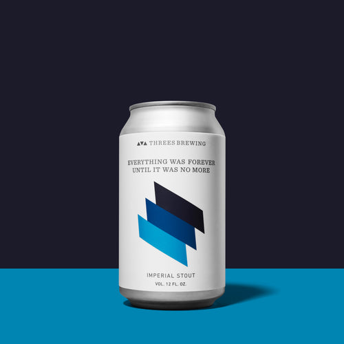 beer can against black and blue background