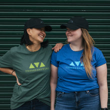 Load image into Gallery viewer, People wearing blue and green triangle logo tees
