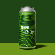 Load image into Gallery viewer, can of beer against dual tone green background
