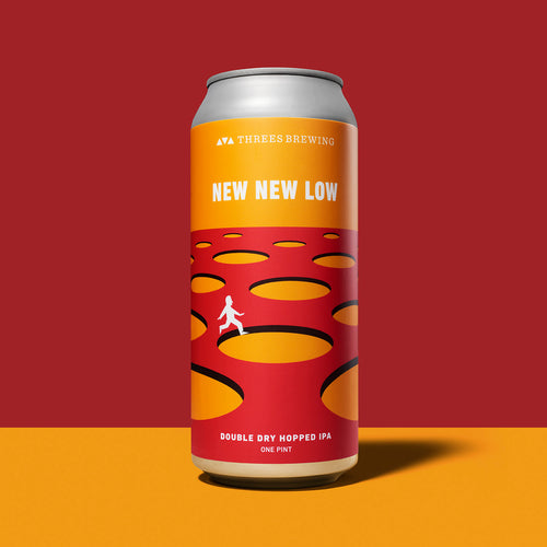 can of beer against red and yellow background