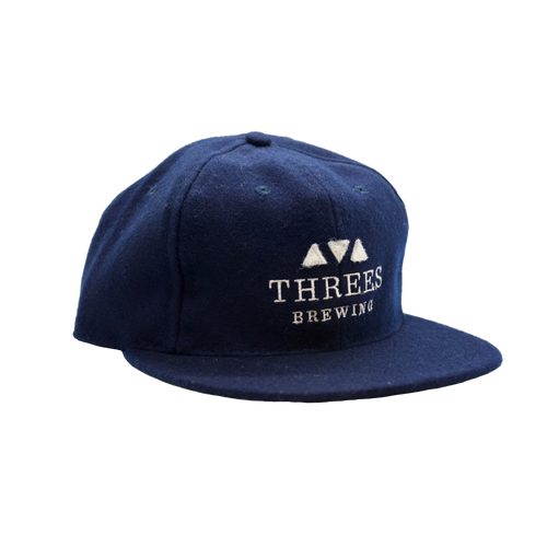 Navy hat with white logo 