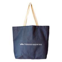 Load image into Gallery viewer, Back of tote bag with threes brewing logo 
